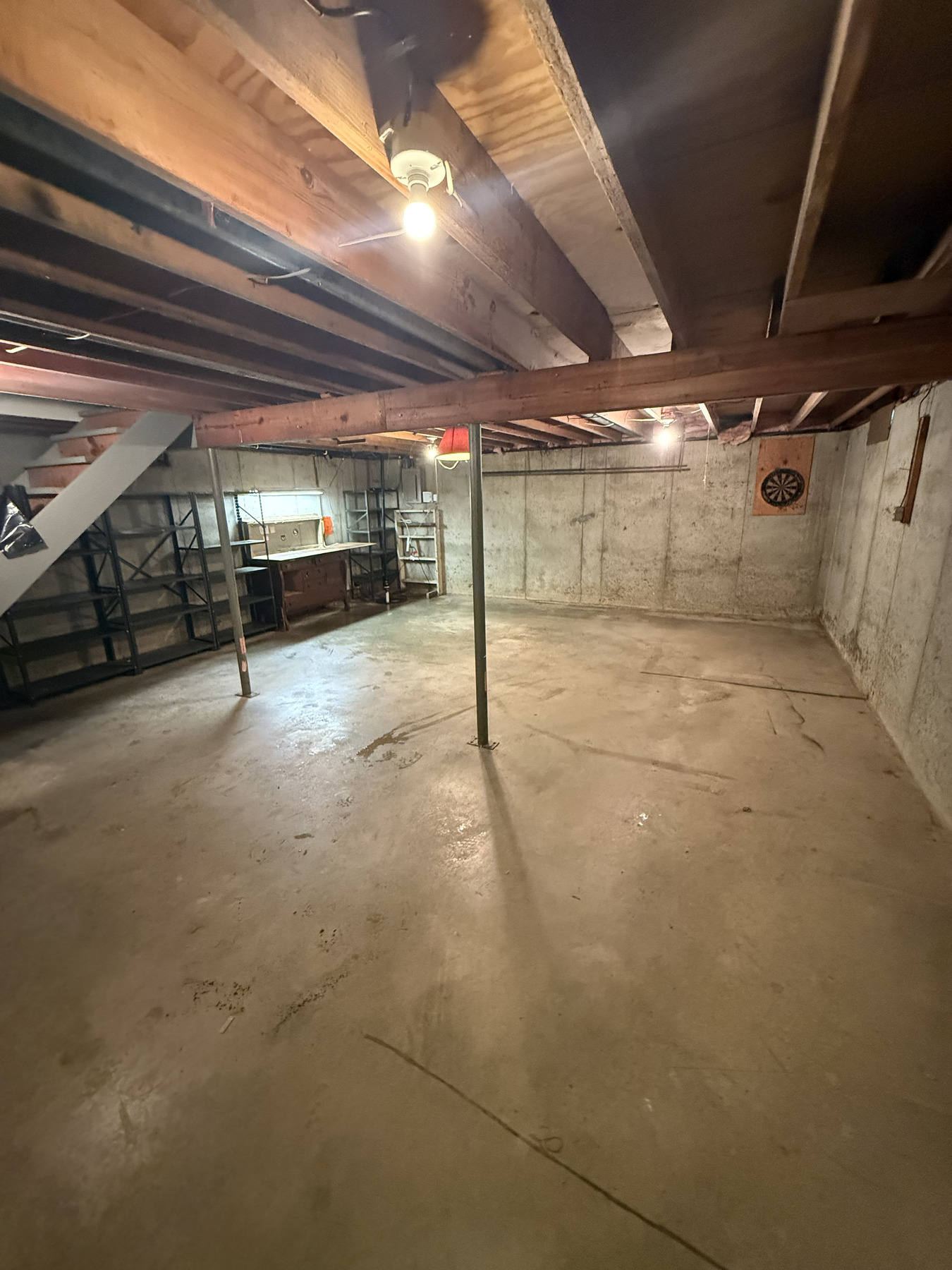 The same basement swept and completely empty after Collier's cleared it out