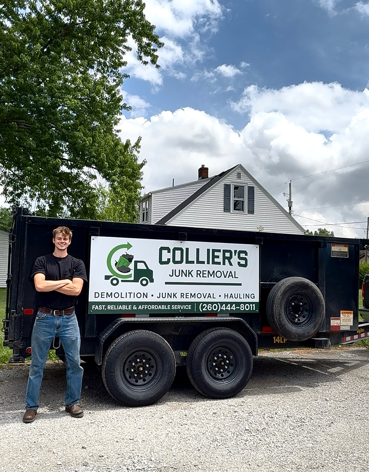 Jake from Collier's Junk Removal giving thumbs up at a deck demolition job