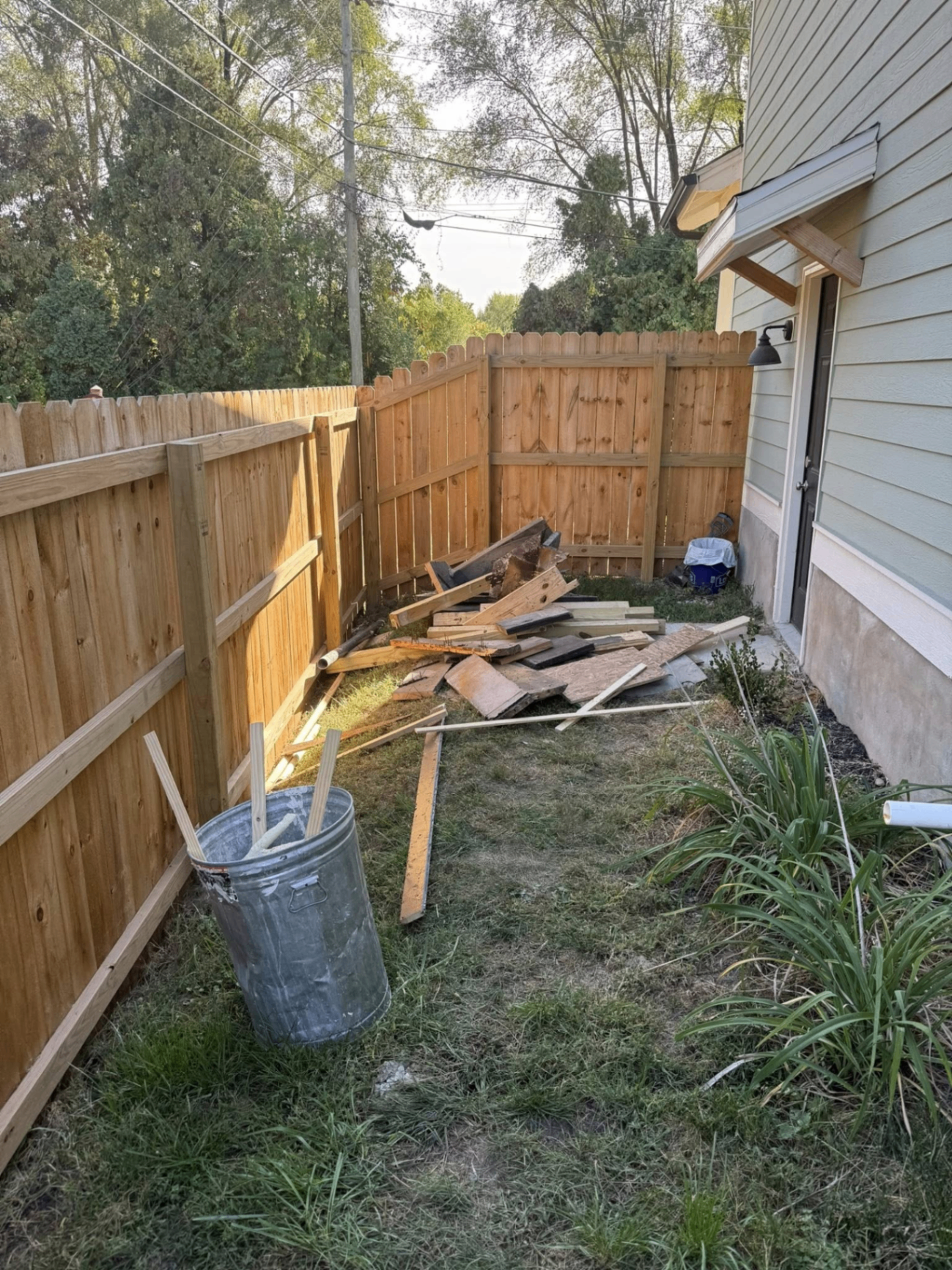 Yard debris pile before removal