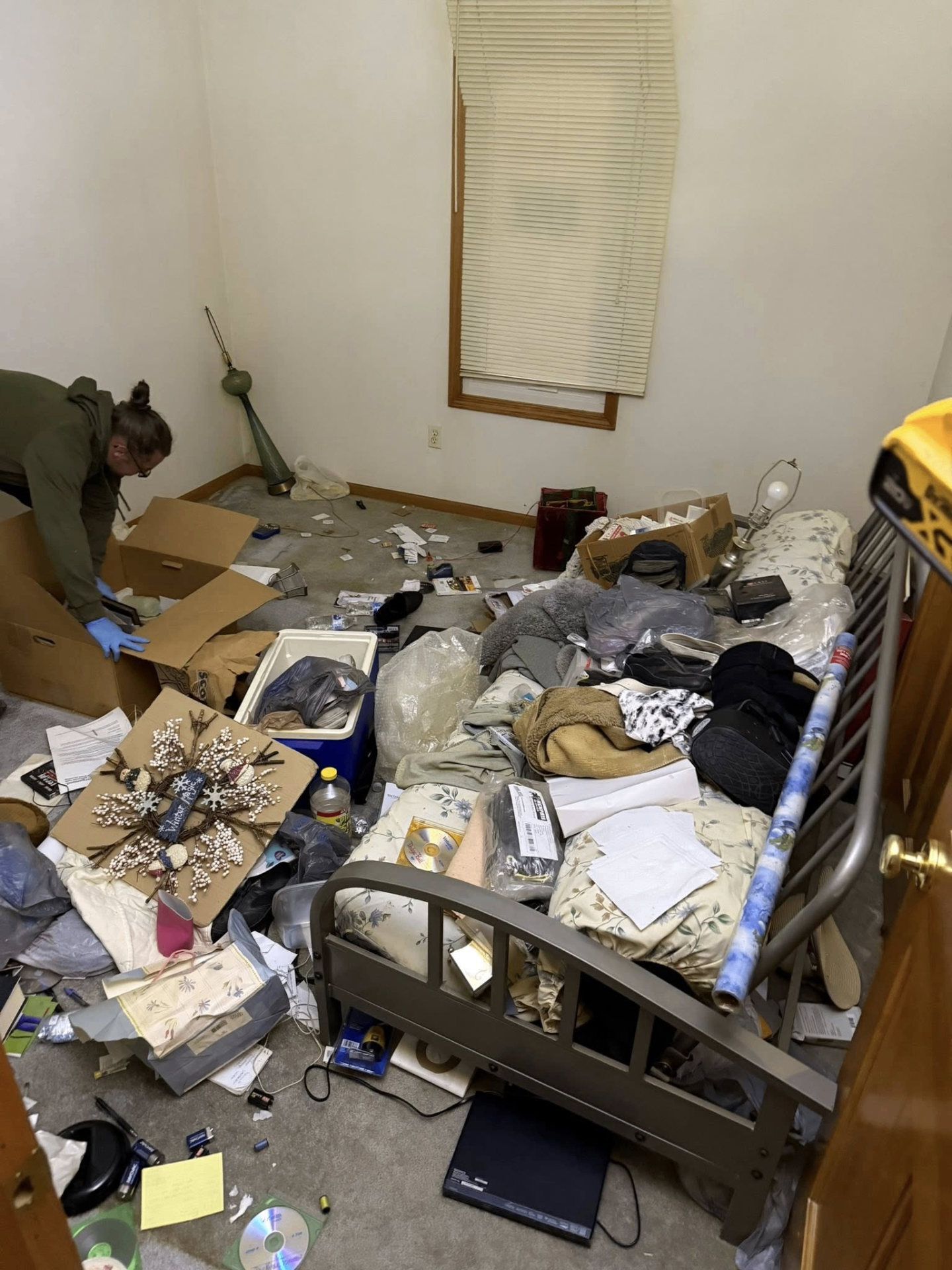 Bedroom clutter before cleanout